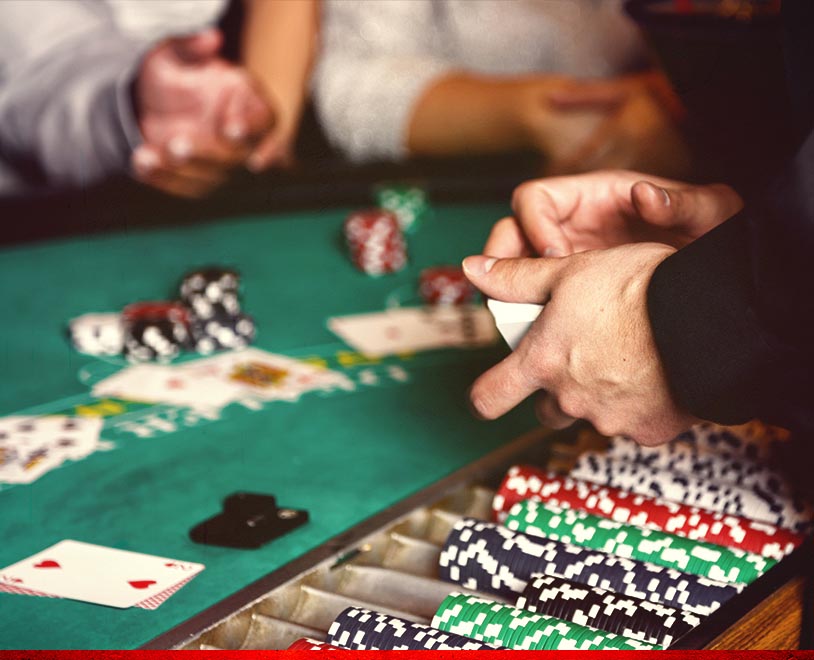 casino table game with croupier hands